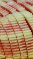 watermelon slices Slicing Watermelon into Easy-to-Eat Portions with Knife Popular summer refreshment. Hands taking red watermelon slices from a plate clearing it. Camera slide. video