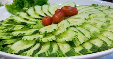 slicing cucumbers fresh cucumbers. chopped cucumber top view video