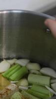 add seasoning to soup Close-up view of woman's hands seasoning hot soup. By adding sugar. Handheld shot video