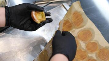 peel the profiterole off the parchment paper. profiterole baking failed. the profiterole broke. broken profiterole video