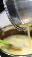 chocolate fondant making process. Step by step mixing ingredients close up Cooking chocolate fondant, pouring into molds, process video