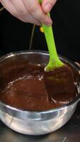 chocolate fondant making process. Step by step mixing ingredients close up Cooking chocolate fondant, pouring into molds, process video