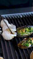 grill scallop with cheese, shells with green onions video