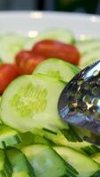 Abstract background of green cucumber slices on white. Top view. video