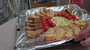 Delightful various types of white cheese and crispy fresh bread with pieces of wood on rustic table video