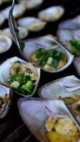 food shellfish. Mussels in a bowl with herbs, rotating on a turntable. Shellfish, seafood close-up video