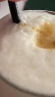 coffee latte foam. Close-up view of coffee texture, espresso shot from top view video