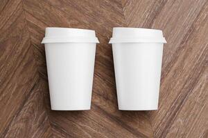 White coffee cup for branding design mockup presentation, minimalist blank rendering close up on aesthetic wooden table photo