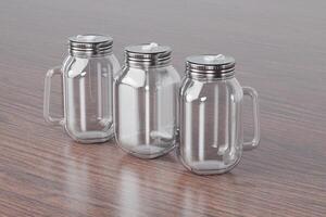 Transparent glass mug jar with stainless steel metal lid and handle placed on a wooden table. Suitable for branding your product with quality 3d rendering. Empty drinking glass, realistic mock-up photo