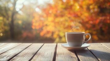 Cup of Coffee on the Table in Autumn photo