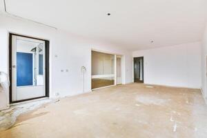 Empty room with a door and a window photo