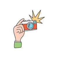 simple doodle of hand hold retro camera with zap flash vector