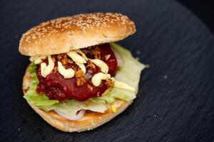 grilled burger from the charcoal grill photo