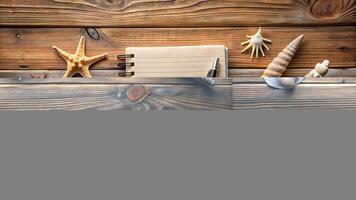 starfish, rustic, wood background, notebook, pen, Marine remembrances still life featuring a notebook seashell starfish and pen arranged on a rustic wood background at eye level photo