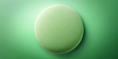 Abstract round shape with grainy texture on soft green gradient background macro photo