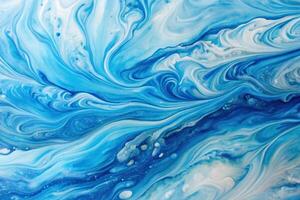 Abstract painting with blue and white liquid paint texture on paper at horizontal tilted angle photo