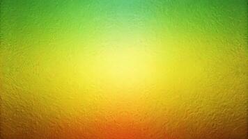 Abstract gradient background with subtle grain texture in green, yellow, and orange tones photo