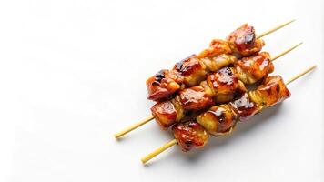 A sweet Yakitori skewer isolated on white background photo