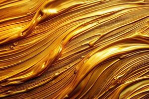 Abstract bright gold texture painted with oil strokes photo