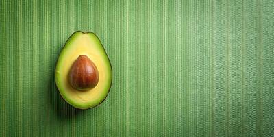 A seamless pattern of aerial avocado half background for stock photo