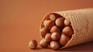 Hazelnuts on brown paper wrapped eco friendly container photo