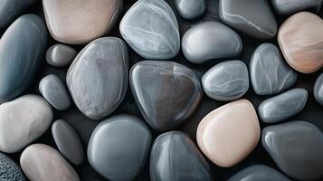 Abstract pattern grey gravel stones smooth glossy texture marble polished modern background photo