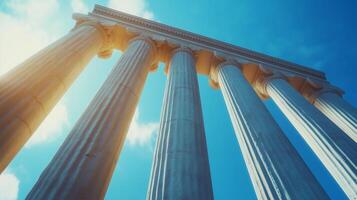 Stone columns concrete texture pillar classical building exterior with sunset sky photo