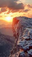 Edge rock cliff in mountain with sunset sky and cloud vertical story nature background photo