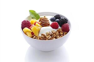 A bowl of yogurt with berries, granola and honey photo