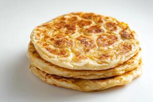 Three pancakes stacked on top of each other photo