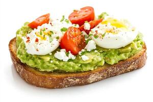 Avocado toast with eggs and tomatoes photo