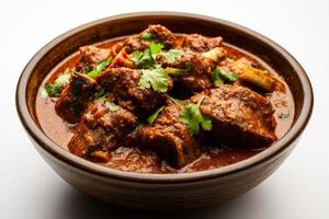 Indian lamb curry in a bowl photo