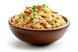 A bowl of fried rice with peas and carrots photo