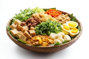 A bowl filled with various types of food photo