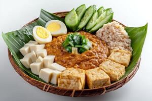 A plate of food with rice, eggs, and vegetables photo