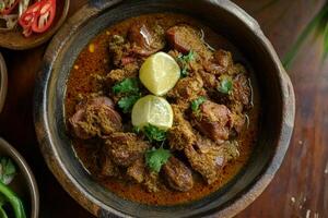 Indian food curry with meat and vegetables photo