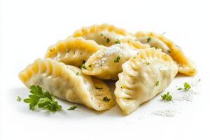 A pile of dumplings on a white surface photo