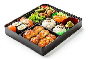 Japanese bento box lunch box with sushi, vegetables and rice photo