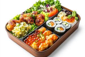 A bento box with sushi, vegetables and rice photo