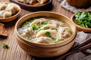 Chinese dumplings in a bowl with herbs photo