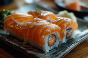 Salmon sushi on a plate photo