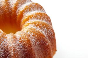 A bundt cake with powdered sugar on top photo
