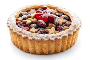 A pastry with berries and nuts on top photo