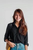 Portrait of asian woman smiling with her handbag on white background photo