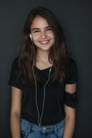 A girl with headphones on smiling photo