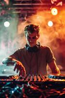 Dj mixing music on a dj mixer photo