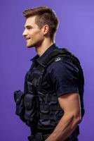 A man in a police vest standing against a purple background photo