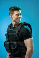 A man in a black vest and black shirt photo