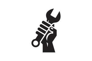 A black and white illustration of a wrench in the hand vector