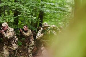 A disciplined and specialized military unit, donned in camouflage, strategically patrolling and maintaining control in a high-stakes environment, showcasing their precision, unity, and readiness for photo